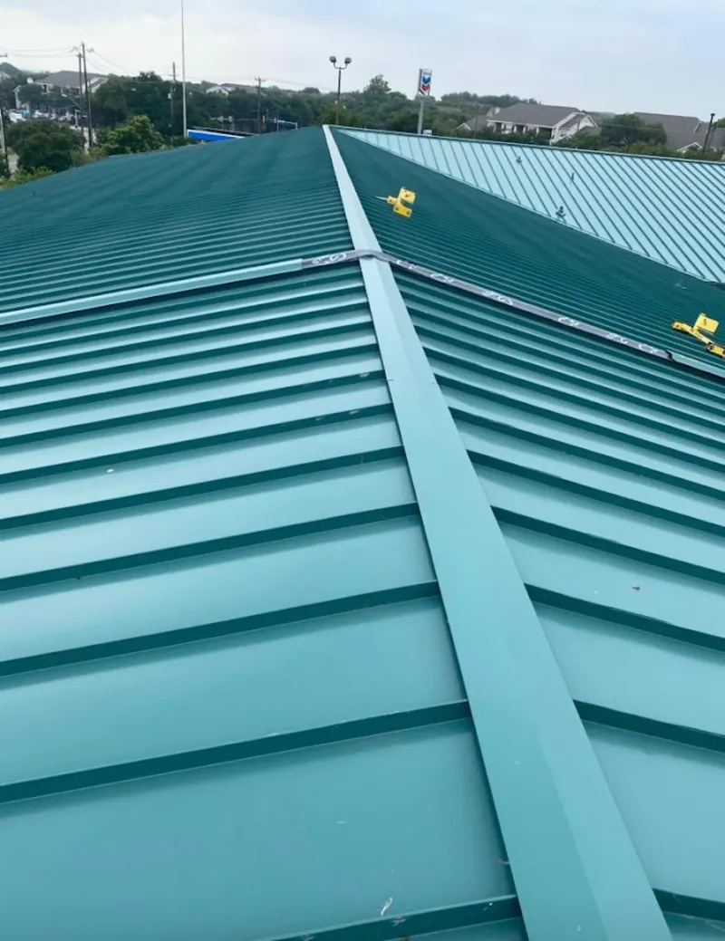 Green commercial metal roof ridge and valley for Metal Roof Repair in North Bethesda