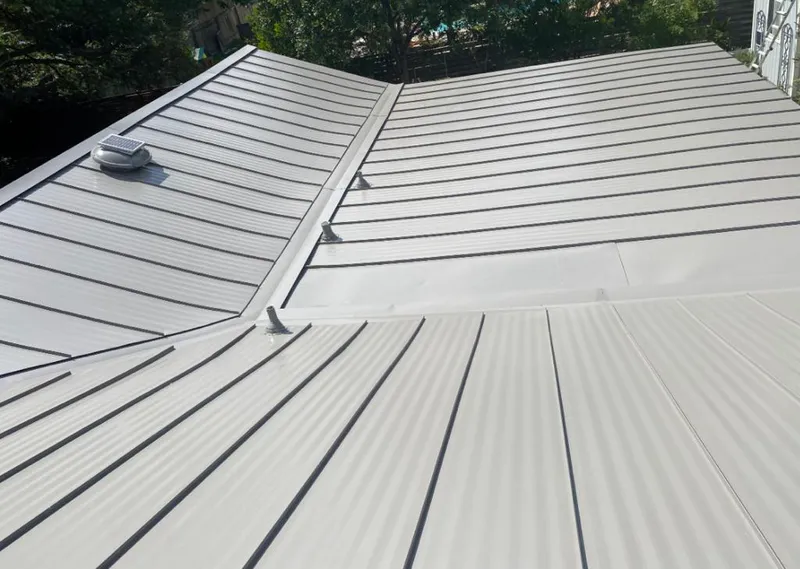 Solar attic fan installed on a metal roof for Roof Ventilation in North Bethesda